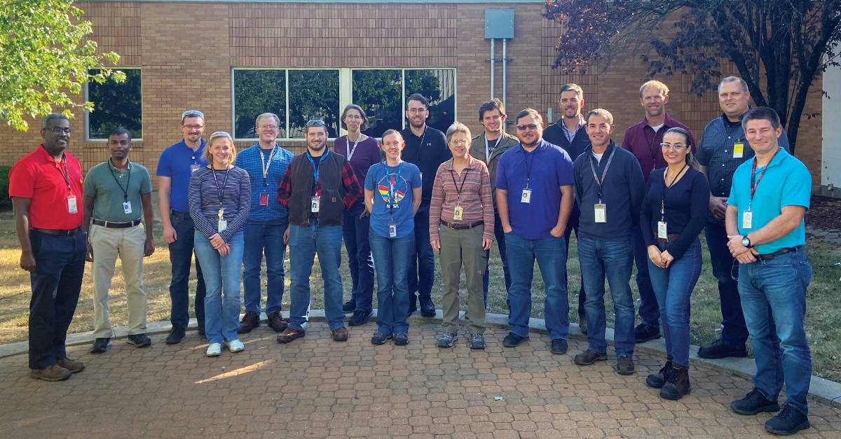 A group of 3M Springfield employees gathered outside the office for a photo.